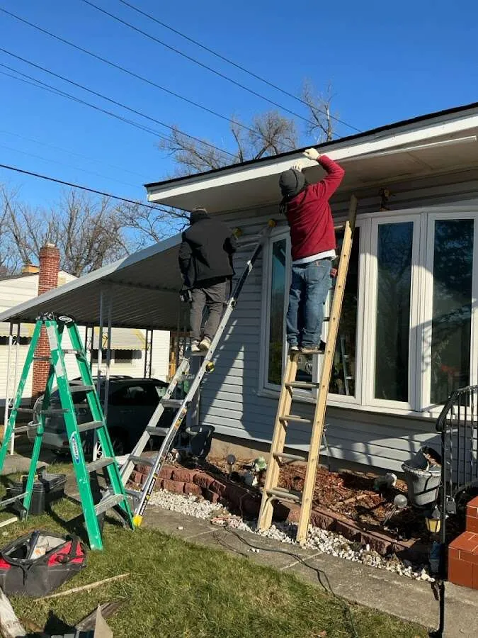 Restoration crew performing exterior repair in Sequim